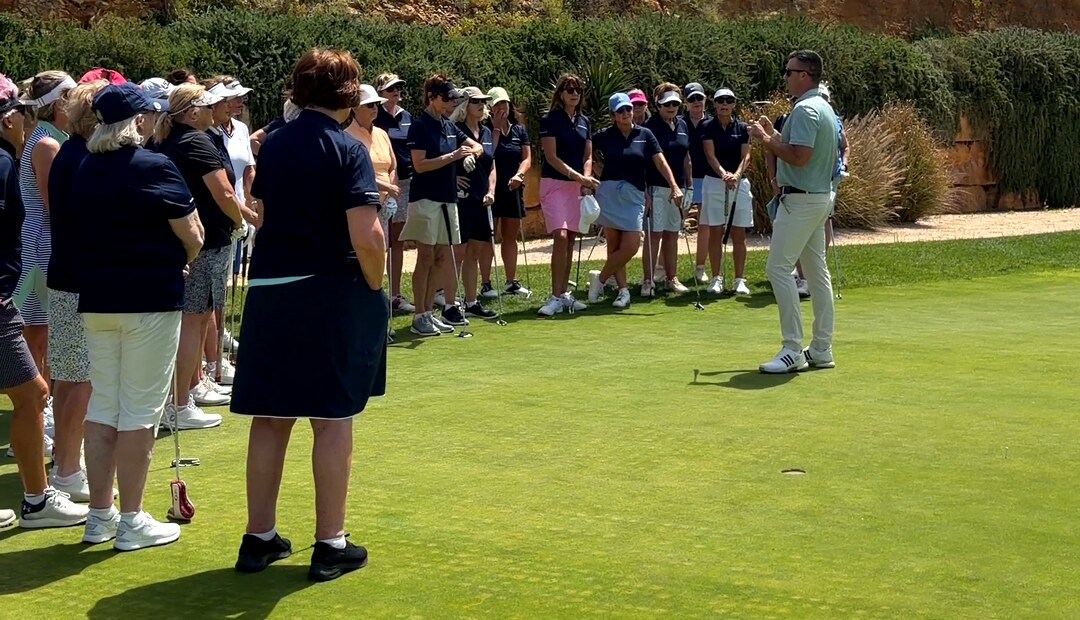 PGA Professional Gary McGrane leading a putting masterclass for a group of lady golfers